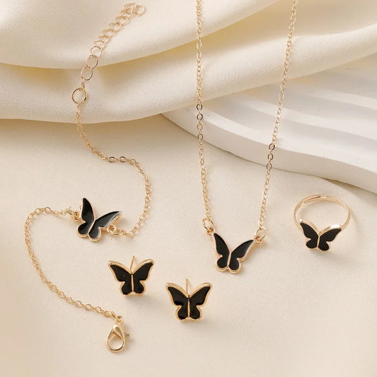 Ensemble Élégant Papillon – Collier, Boucles, Bracelet & Bague