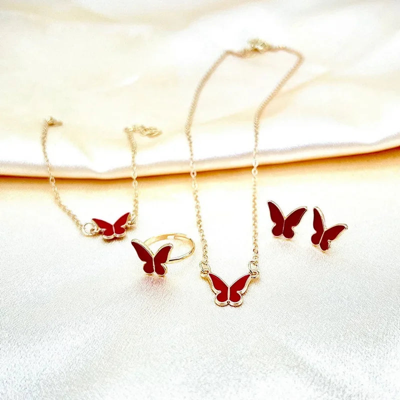 Ensemble Élégant Papillon – Collier, Boucles, Bracelet & Bague